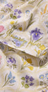 Floral patterned fabric with 'Everyday Power' text on a white background