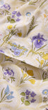 Floral patterned fabric with 'Everyday Power' text on a white background
