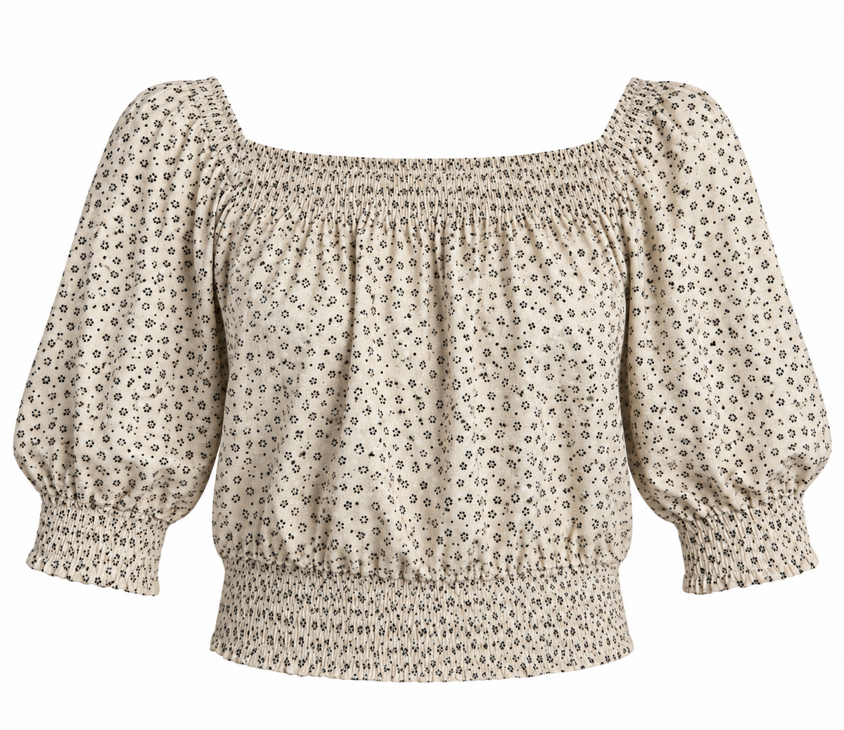 A beige puff-sleeve blouse with a small black floral pattern, featuring a smocked neckline and a smocked hem, shown against a plain white background.