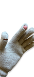 Beige knit glove on a white background